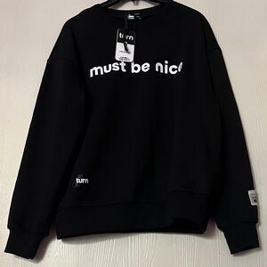 TURN Black my Sweater Size XS ptp 22 inches top to bottom 25 inches approx